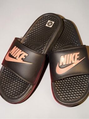 Nike Black Slides with Pink Metallic Logo